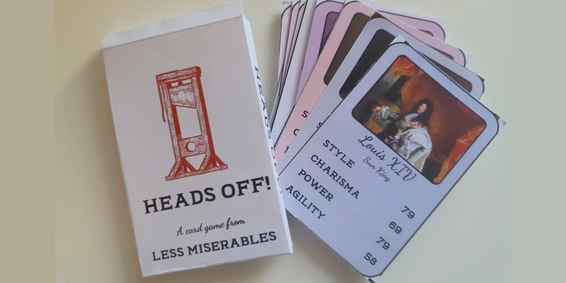 A box saying 'Heads Off!' and a bunch of badly printed cards